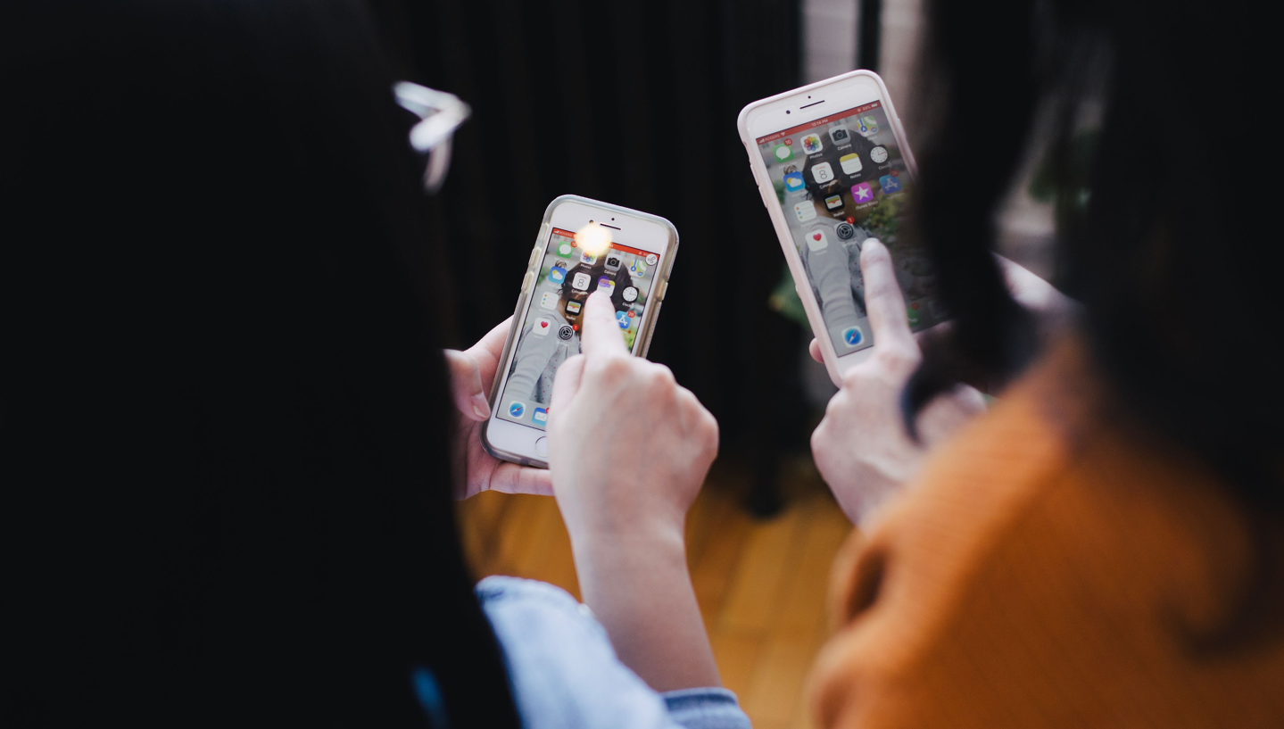 People using their mobile phones