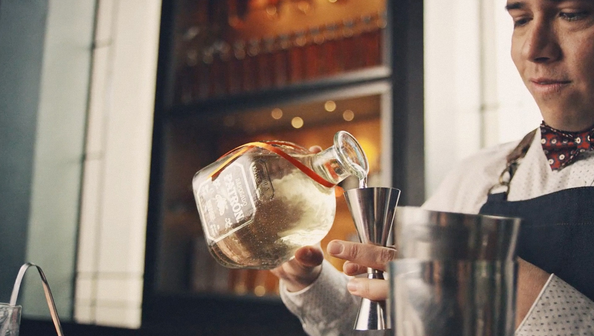 Bartender pouring Patròn Tequila